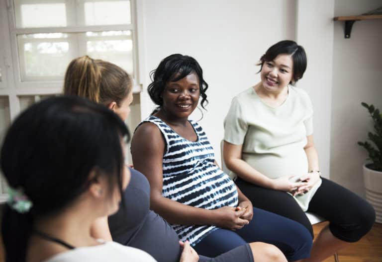 Pregnant women in a class